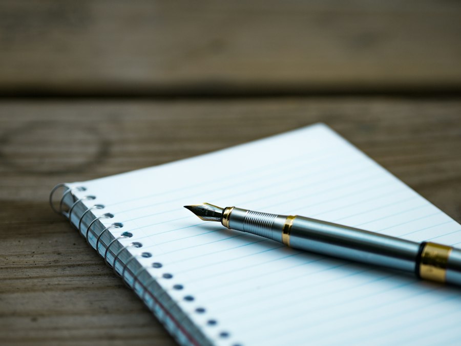 Desk with notebook and pens